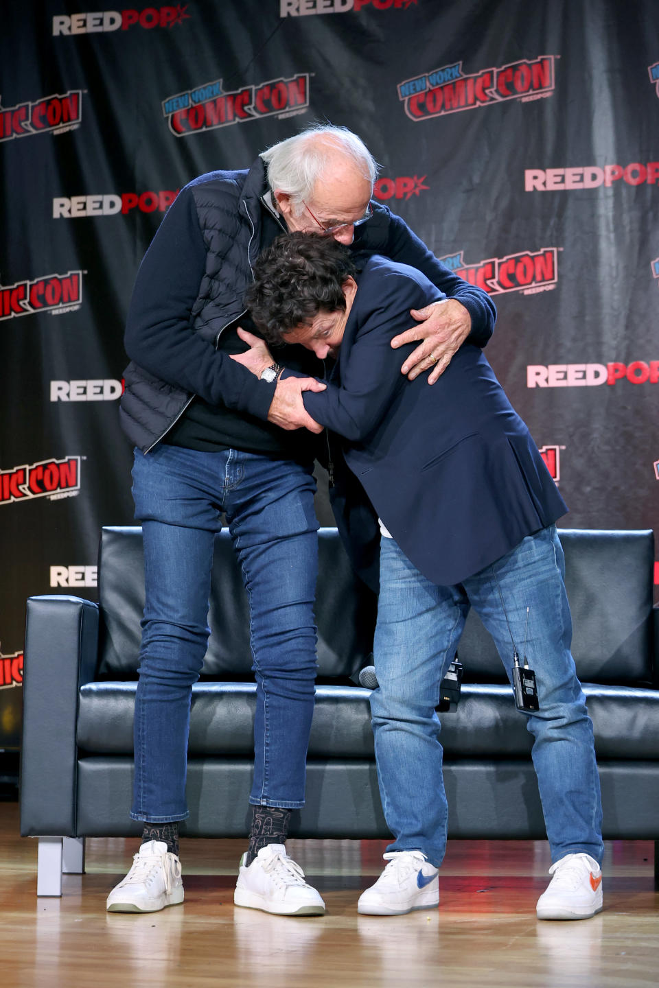 NEW YORK, NEW YORK - OCTOBER 08: Actors Christopher Lloyd (L) and Michael J. Fox attend a "Back To The Future Reunion" at New York Comic Con on October 08, 2022 in New York City. (Photo by Mike Coppola/Getty Images for ReedPop)