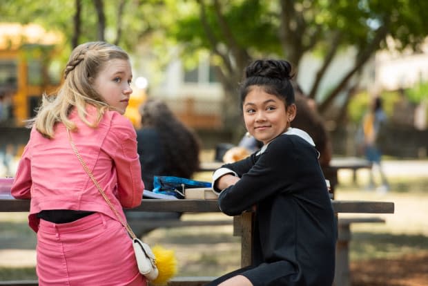 <em>"I wore a special smart outfit. Ruth Bader Ginsberg chic. </em><em>Super</em><em> cute." Tamada as Claudia, right, sits with real life friend Shay Rudolph as Stacey.</em>