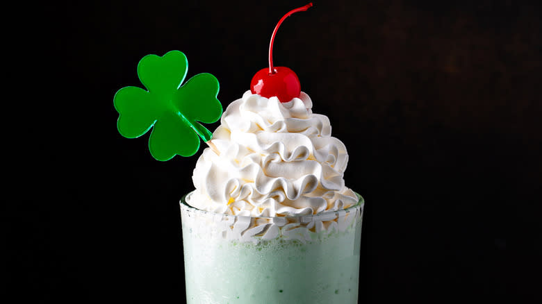 Shamrock shake against black background