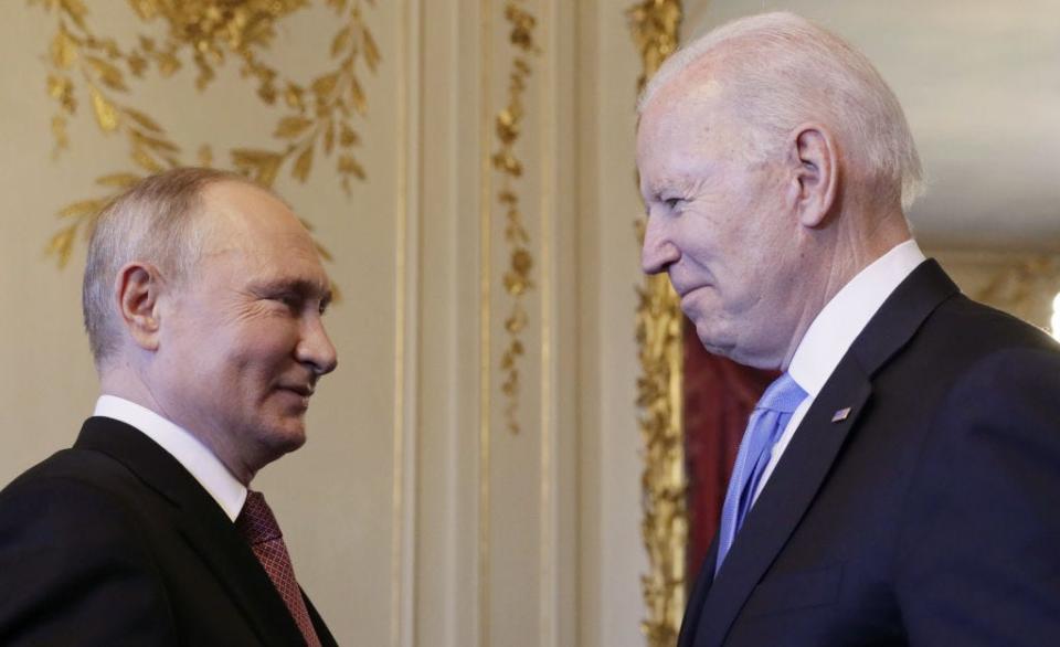 Vladimir Putin and Joe Biden meet in 2021