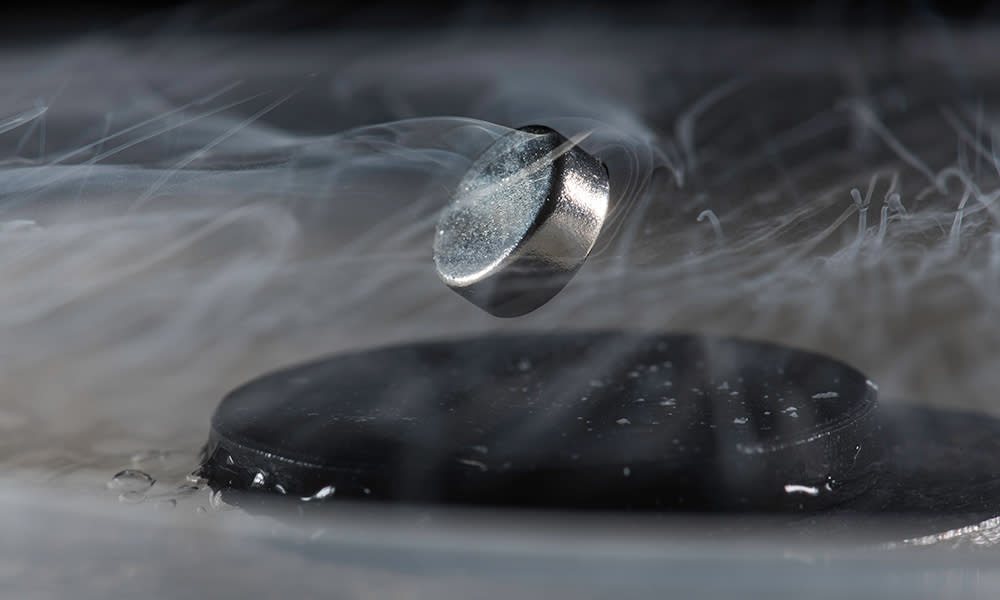  A supercooled superconductor floats above a magnet. 