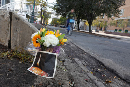 Flowers placed by a bike path in honour of the victims of the Tuesday's attack are seen in New York, U.S., November 2, 2017. REUTERS/Shannon Stapleton