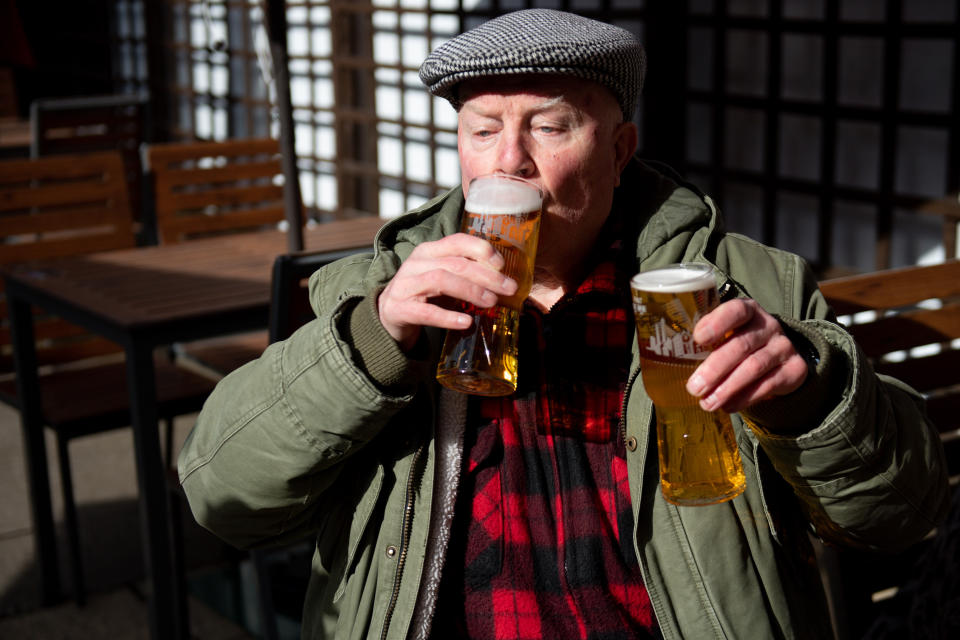 <p>John Witts enjoys a drink at the reopening of the Figure of Eight pub, in Birmingham, as England takes another step back towards normality with the further easing of lockdown restrictions. Picture date: Monday April 12, 2021.</p>
