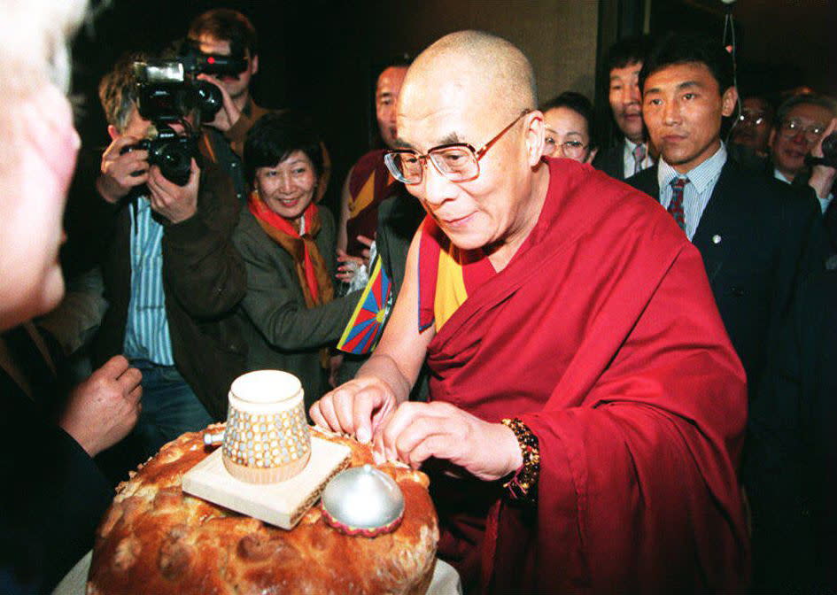 The spiritual leader of Tibet, the Dalai Lama, tri