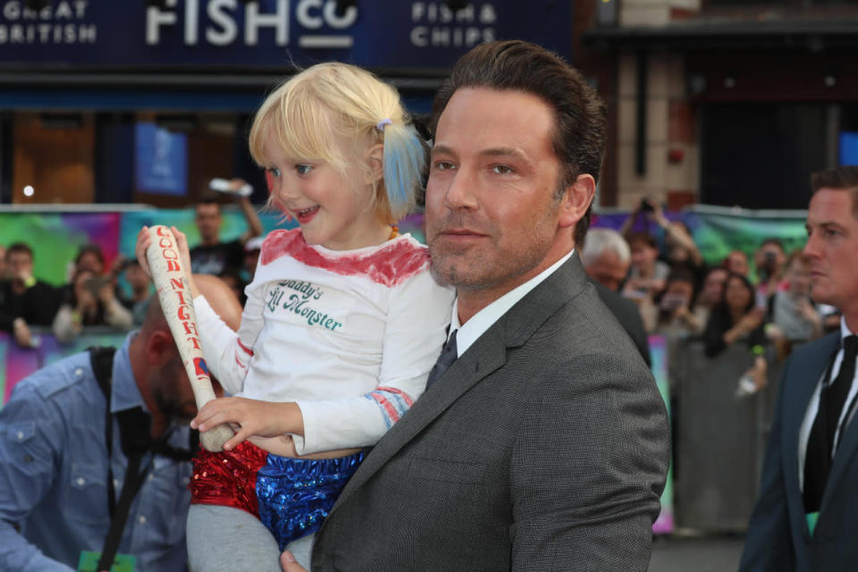 Ben Affleck with his daughter Violet who dressed up as Harley Quinn for the occasion 