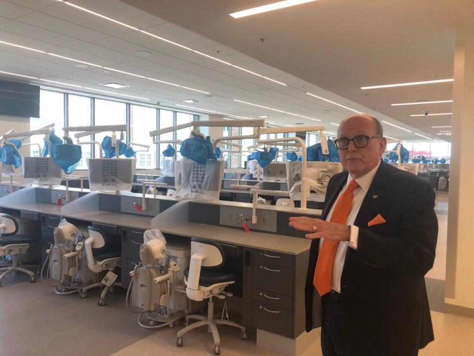 James C. Ragain, University of Tennessee Health Science Center College of Dentistry dean, gives a tour of the college's new $45 million facility, which includes a skills lab.