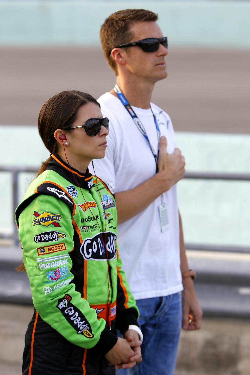 HOMESTEAD, FL - NOVEMBER 20:  Danica Patrick, driver of the #7 GoDaddy.com Chevrolet, stands with her husband Paul Hospenthal prior to the NASCAR Nationwide Series Ford 300 at Homestead-Miami Speedway on November 20, 2010 in Homestead, Florida.  (Photo by Chris Trotman/Getty Images for NASCAR)