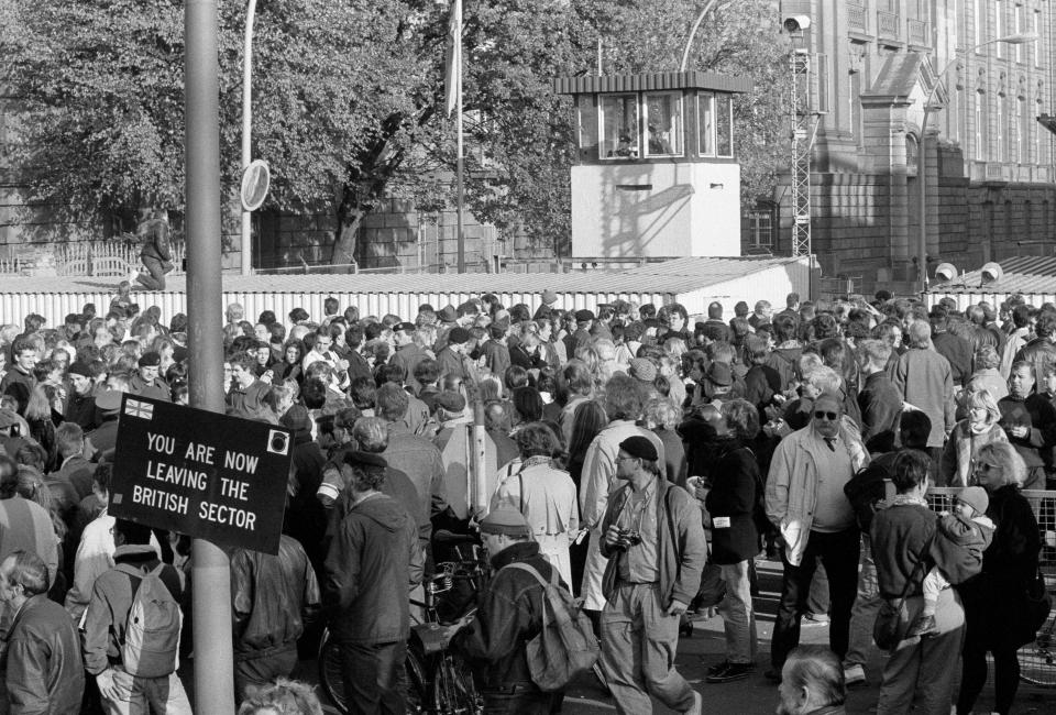 West Berlin citizens welcome East Germans who passed the border checkpoint Invalidenstrasse after the opening of the East German border was announced in Berlin,  Nov. 9, 1989. (Photo: Fabrizio Bensch/Reuters)