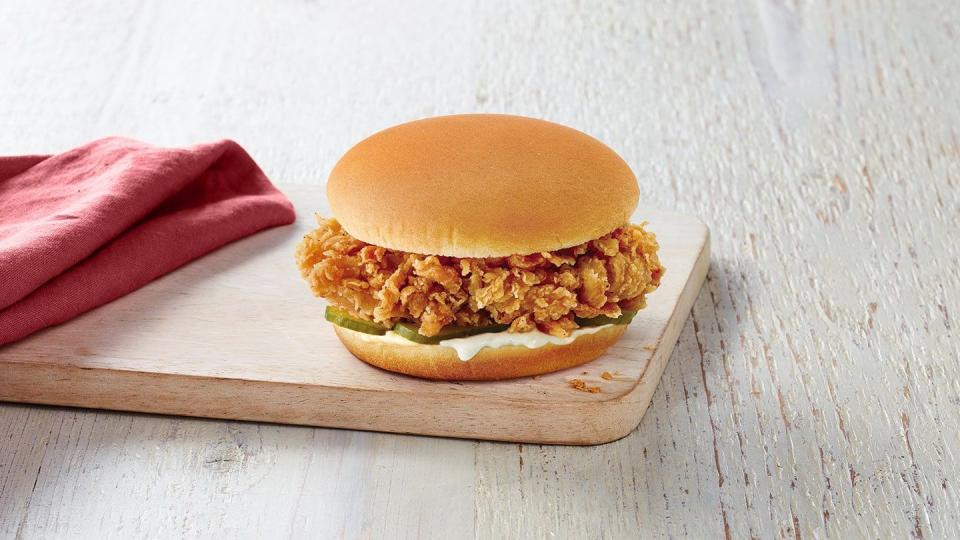 <p>While I hoped to enjoy <a href="https://www.kfc.com/menu/sandwiches/crispy-colonel-sandwich" rel="nofollow noopener" target="_blank" data-ylk="slk:KFC’s Crispy Colonel Sandwich;elm:context_link;itc:0;sec:content-canvas" class="link ">KFC’s Crispy Colonel Sandwich</a>, I can’t say that I did. While it promises crisp, it was more chewy than crispy. Compared to other restaurants’ sandwiches, I was surprised at how small this sandwich actually is. The bun wasn’t anything special and seemed like a missed opportunity to compliment the meat. </p>