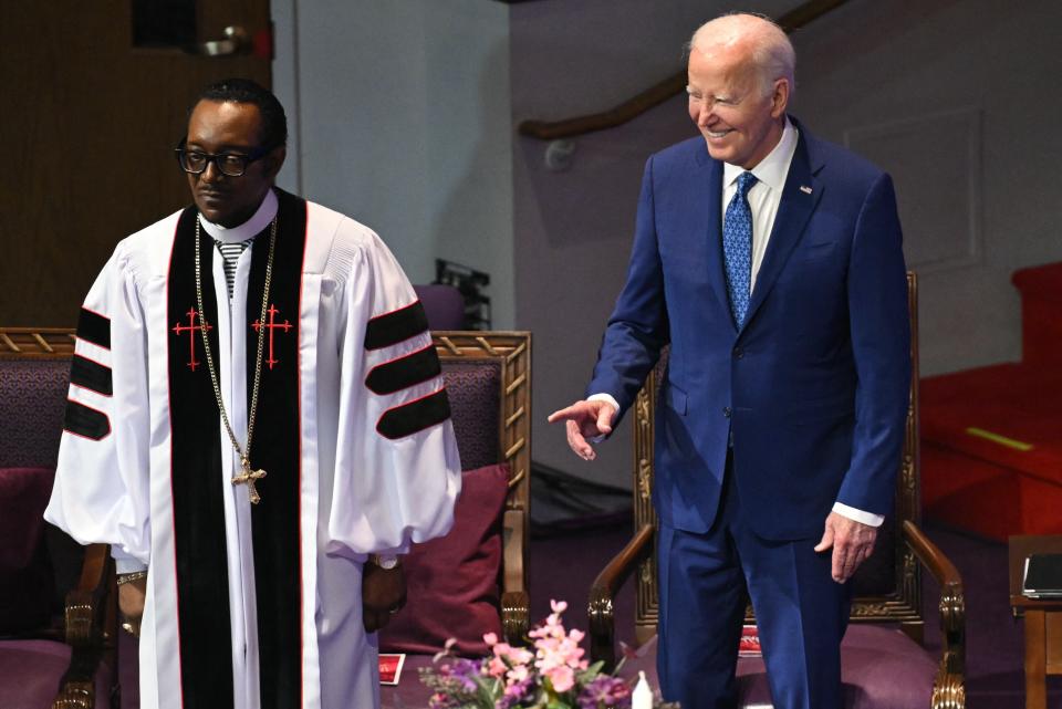 US President Joe Biden (R) stands with Bishop Louis Felton during a church service and campaign event at Mount Airy Church of God in Christ in Philadelphia, Pennsylvania, on July 7, 2024 (AFP via Getty Images)