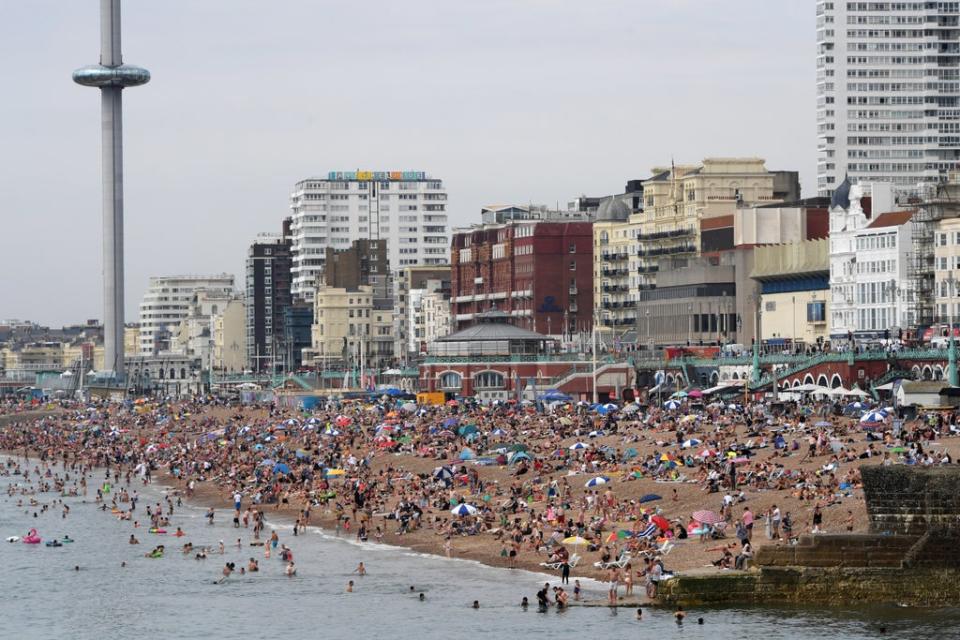 Brighton beach is packed as Britain experiences a three-day summer heatwave in August 2020, with temperatures reaching up to 38C in the South East (Getty Images)