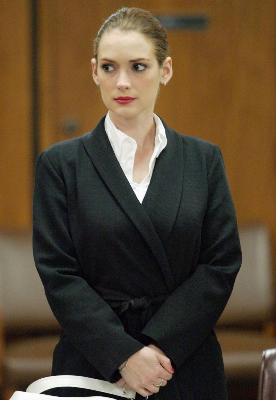 Actress Winona Ryder appears at Beverly Hills Superior Court April 7, 2003 in Beverly Hills for a progress report following her conviction for shoplifting from Saks Fifth Avenue in Beverly Hills (AP)