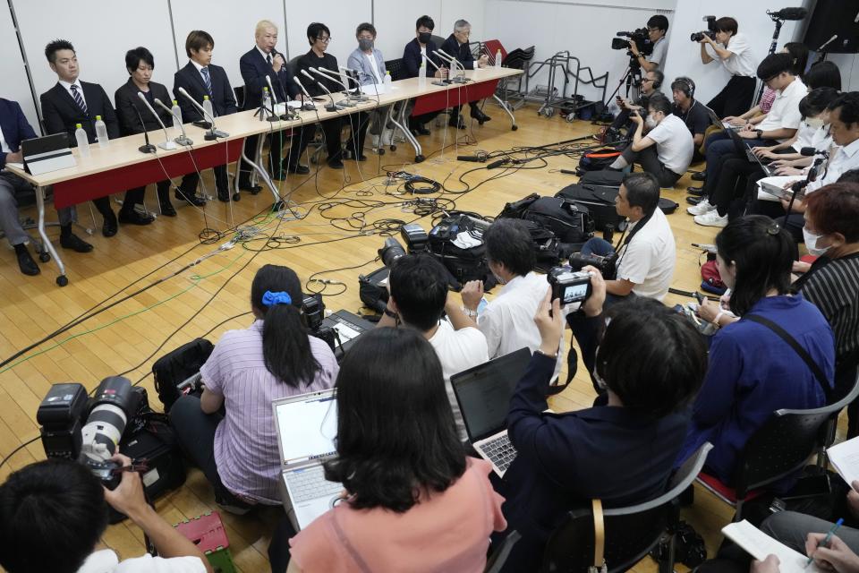 Accusers in Japanese boy band producer Johnny Kitagawa's sex scandal, attend a news conference in Tokyo Monday, Sept. 4, 2023. A group of men who say they were sexually abused by the Japanese boy band producer expressed hope Monday that the company will agree to provide financial compensation and introduce measures to prevent a recurrence. (AP Photo/Eugene Hoshiko)