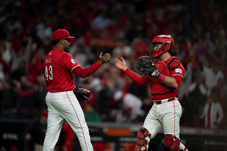 Cincinnati Reds relief pitcher Alexis Díaz and catcher Tyler Stephenson