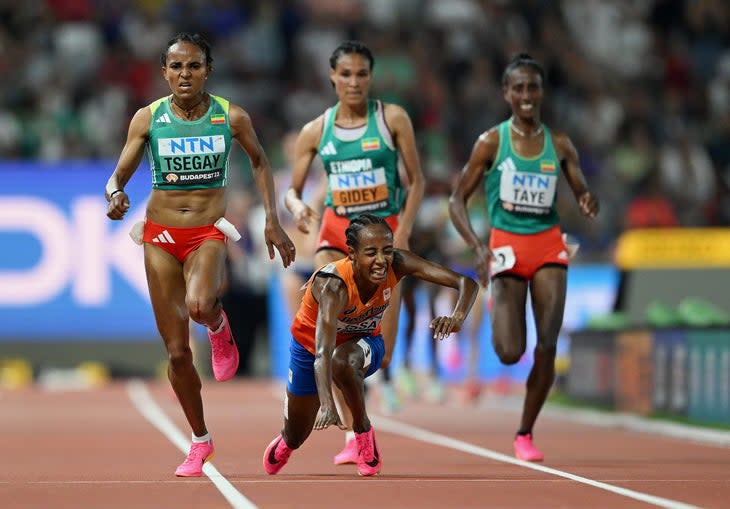 <span class="article__caption">BUDAPEST, HUNGARY – AUGUST 19: Sifan Hassan of Team Netherlands falls in the Women’s 10000m Final during day one of the World Athletics Championships Budapest 2023 at National Athletics Centre on August 19, 2023 in Budapest, Hungary. (Photo by Shaun Botterill/Getty Images)</span>