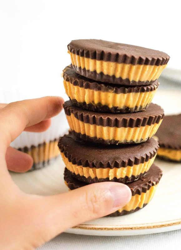 <p>Dish by Dish</p><p>These 4-ingredient homemade peanut butter cups come together so easily, and make the perfect sweet treat. Gluten-free and vegan.</p><p><strong>Get the recipe: <a href="https://www.dishbydish.net/homemade-peanut-butter-cups/" rel="nofollow noopener" target="_blank" data-ylk="slk:Homemade Peanut Butter Cups (Gluten-Free, Vegan);elm:context_link;itc:0;sec:content-canvas" class="link ">Homemade Peanut Butter Cups (Gluten-Free, Vegan)</a></strong></p>