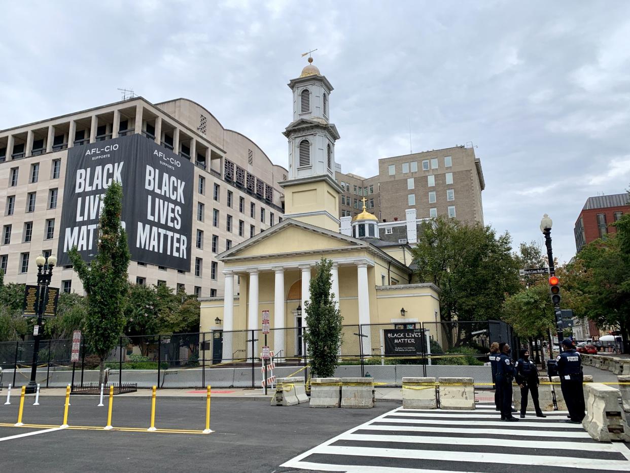 Washington, DC, USA - September 25, 2020: Group of policemen is standing in front of  St. John's Episcopal Church in Washington, D.C. USA.