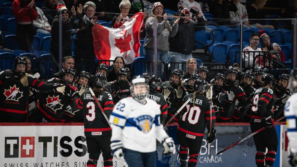 Canada's Brianne Jenner (right) celebrates with teammates, including Sarah Fillier (3) and Jocelyne Larocque (10), after scoring the initial goal against Finland Thursday at the Adirondack Bank Center.