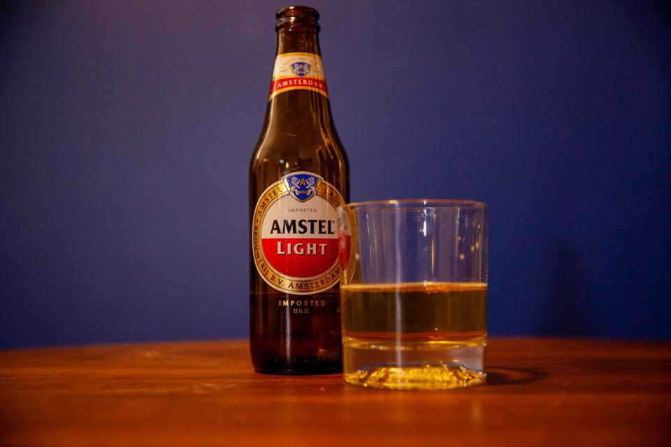Amstel Light beer in bottle and glass