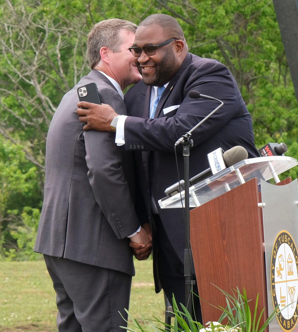 The City of Tuscaloosa broke ground at the Oliver Lock and Dam Park in West Tuscaloosa for a Riverwalk extension Monday, May 8, 2023. Mayor Walt Maddox embraces City Councilman Matthew Wilson in whose district the extension is being constructed.