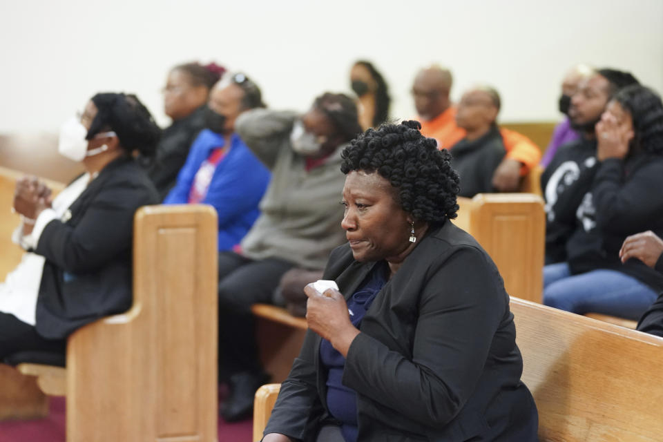 Elder Sharon Hammond uses a tissue during a vigil for a group of Americans recently kidnapped in Mexico, at Word of God Ministries in Scranton, S.C., Wednesday, March 8, 2023. Two of the four Americans, all from South Carolina, were killed after being caught in a deadly shootout while traveling last week to Matamoros for one of them to get cosmetic surgery. (AP Photo/Sean Rayford)