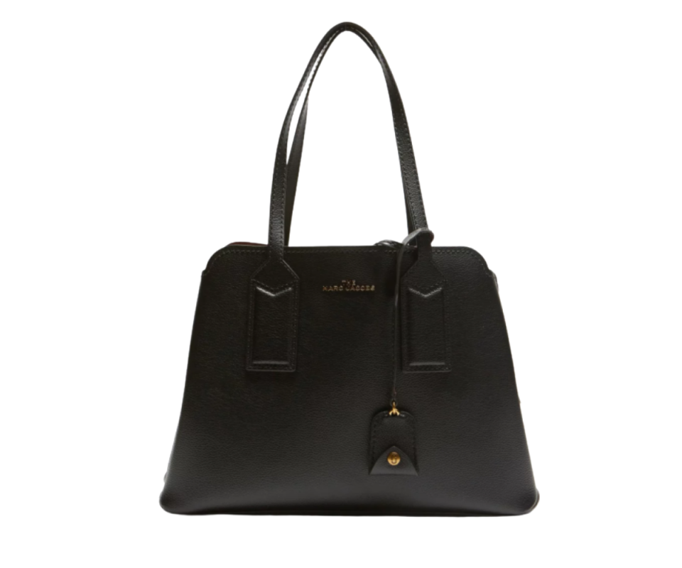 Marc Jacobs black handbag with handle against a white background.