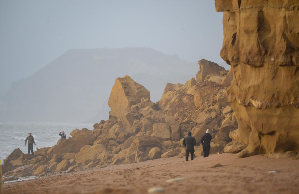 BURTON BRADSTOCK, UNITED KINGDOM - DECEMBER 17: General view of the large cliff fall at Hive beach on December 17, 2020 in Burton Bradstock, Dorset, England. Dorset Council said its rangers are currently at the scene to assess the rock fall and the coastal path on cliffs above. (Photo by Finnbarr Webster/Getty Images)