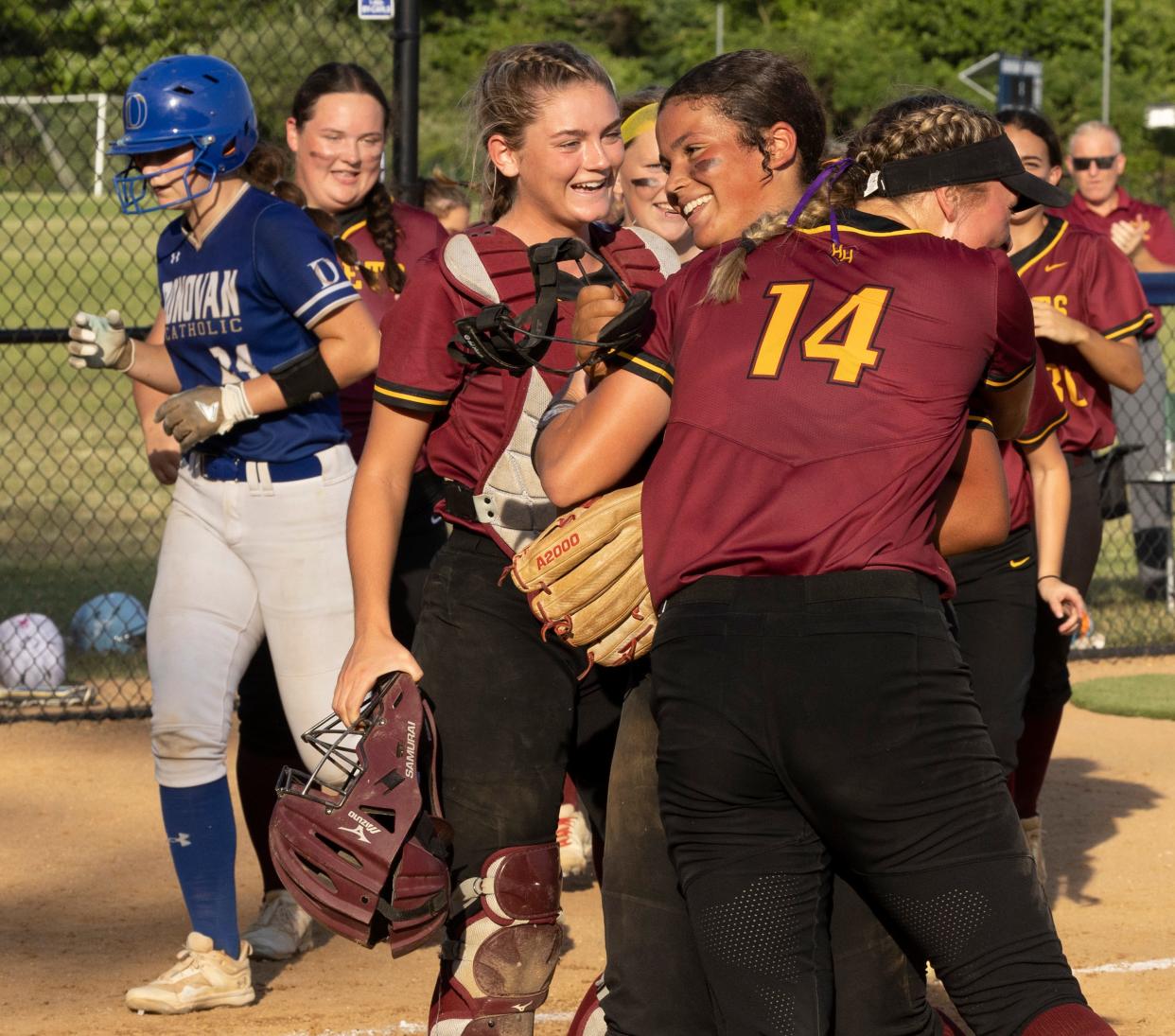 Haddon Heights playrers mob their pitcher Sophia Bordi as they defeat Donovan Catholic. Haddon Heights defeats Donovan Catholic 6-1 in Tournament of Champions semifinal game in Toms River on June 8, 2022. 