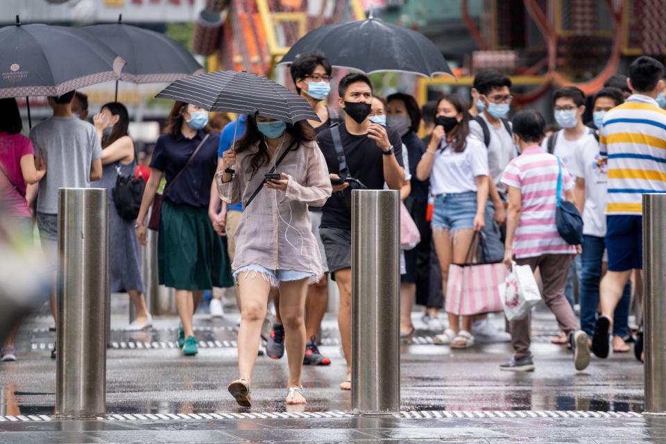 People walking along the Orchard Road in Singapore.