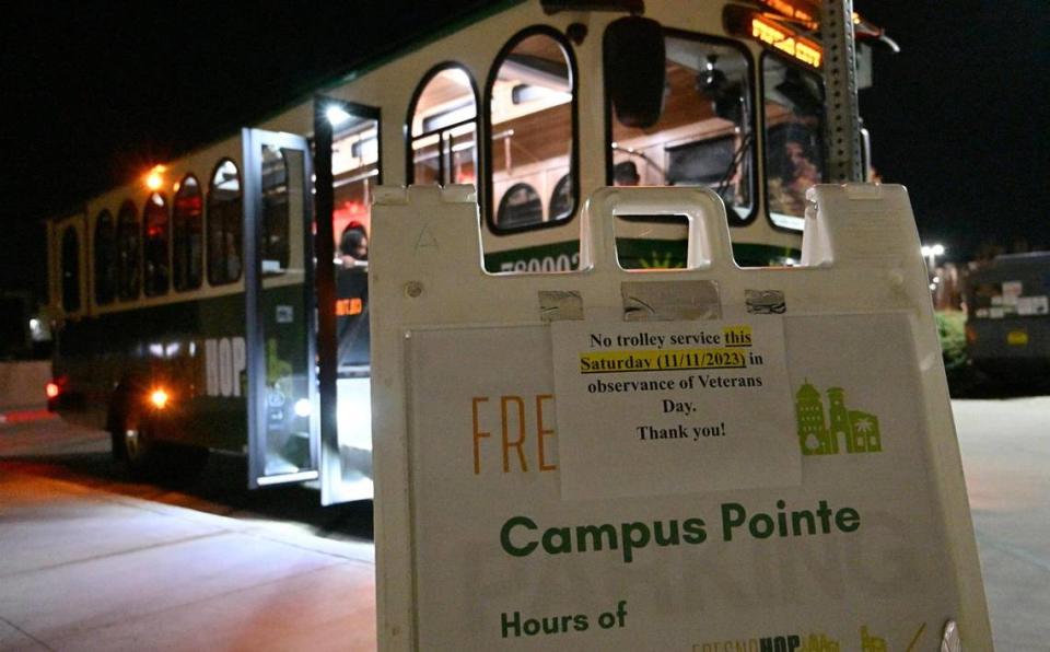 The City of Fresno’s new FresnoHOP waits for riders at Fresno State’s Campus Pointe Friday night, Nov. 10, 2023 in Fresno. The new service will leave every hour on the hour from two key locations, the Tower District and Campus Pointe on Thursdays from 5pm-12am and Fridays and Saturdays from 5pm-1am.