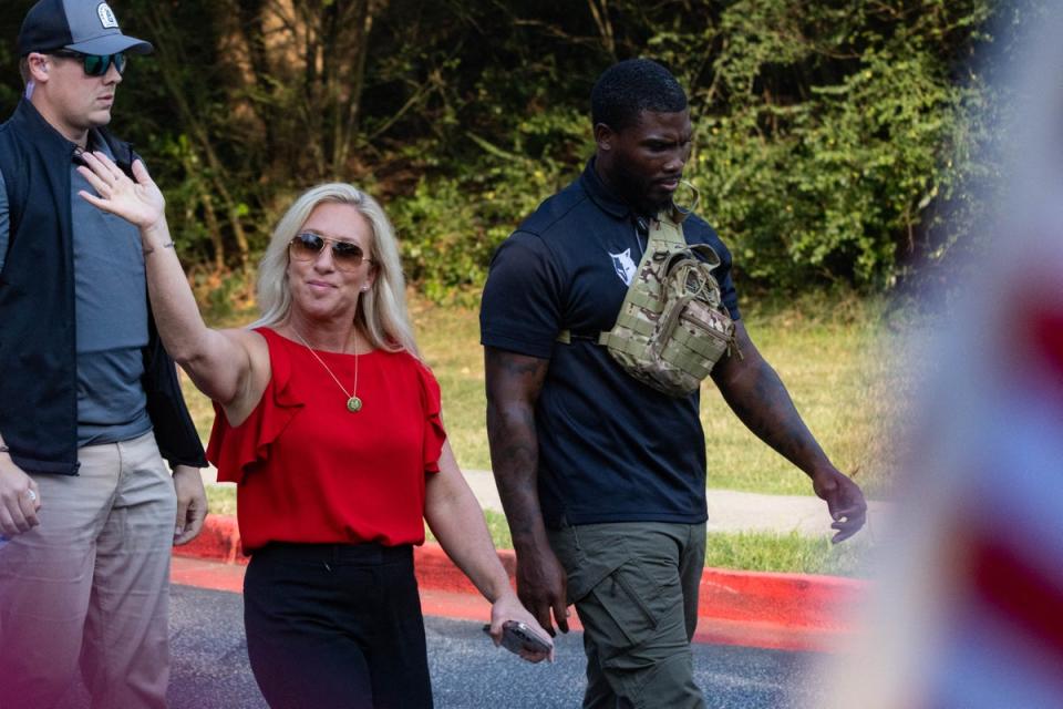 Representative Marjorie Taylor Greene (R-GA) arrives to speak to the media as they wait the arrival of former President Donald Trump outside the Fulton County Jail on August 24, 2023, in Atlanta, Georgia (AFP via Getty Images)