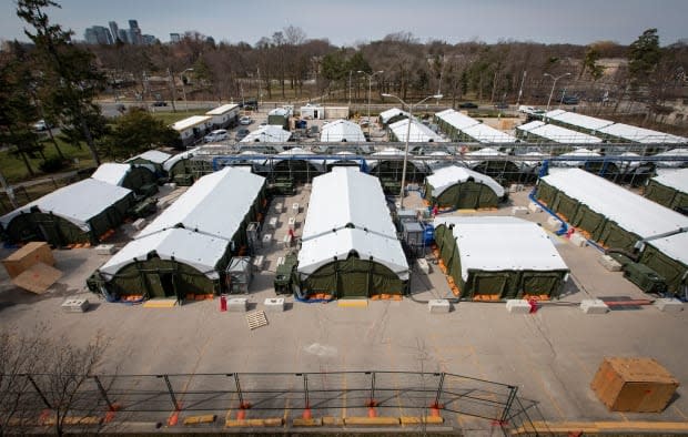 A Toronto field hospital, set up in a parking lot, is getting ready to accept COVID-19 patients. Sunnybrook Health Sciences Centre says its mobile health unit will likely open this week. (Evan Mitsui/CBC - image credit)