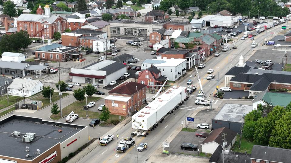 Dozens of people came out in downtown Waverly, Ohio, to watch as the Super Load is moved from an Ohio River dock to the Intel chip-manufacturing plant in New Albany, Ohio. The Pike County Courthouse is visible at upper left.