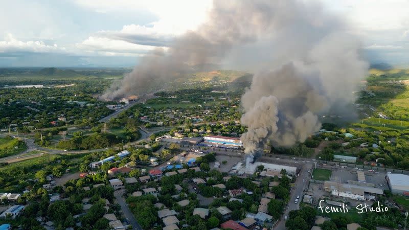 Aerial view shows burning buildings amid protests over a pay cut for police that officials blamed on an administrative glitch, in Port Moresby