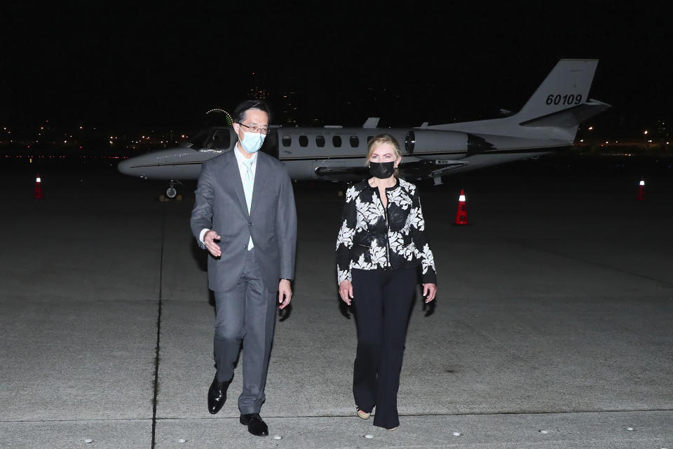 In this photo released by the Taiwan Ministry of Foreign Affairs, United States Senator Marsha Blackburn, R-Tenn. walks with Douglas Yu-Tien Hsu, Director-General, Taiwan's dept. of North American Affairs, as she arrives on a plane in Taipei, Taiwan on Thursday, Aug. 25, 2022. The U.S. lawmaker arrived in Taiwan on Thursday, the second congressional delegation to visit the island after House Speaker Nancy Pelosi did so earlier this month, sharply raising tensions with China. (Taiwan Ministry of Foreign Affairs via AP)