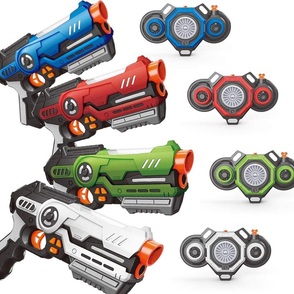 Set of four laser tag guns and vests