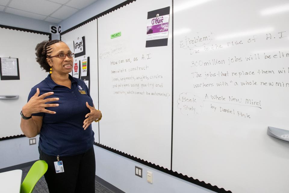 Marilynn Griffith, a math teacher at Tallahassee Collegiate Academy, explains what one of the projects is that her students will be working on this upcoming school year Monday, Aug. 7, 2023. 