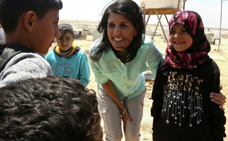 US Ambassador to the UN Nikki Haley talks to Syrian refugees during a visit to the Zaatari refugee camp on the Jordanian border with Syria on May 21, 2017