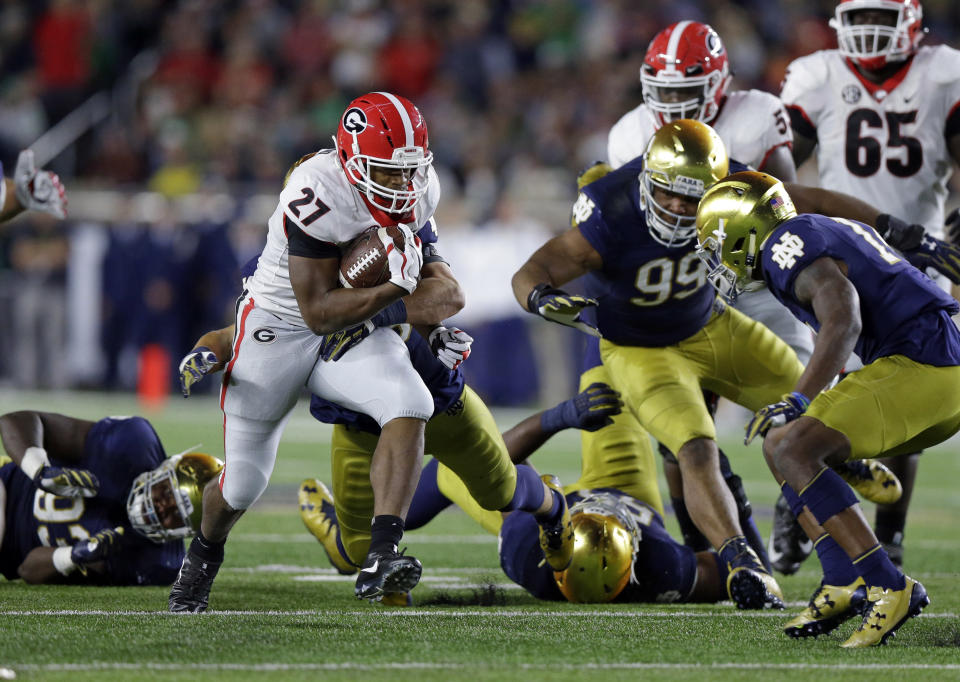 Georgia running back Nick Chubb (27) carries against Notre Dame during the first half of an NCAA college football game in South Bend, Ind., Saturday, Sept. 9, 2017. (AP Photo/Michael Conroy)