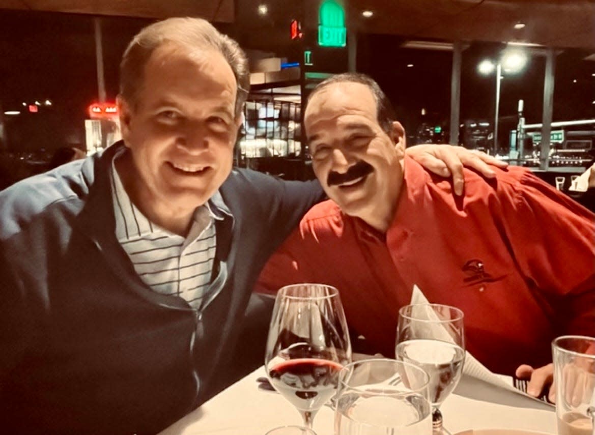 Jim Nantz and fellow Houston alum Jim Perry from Michigan with a glass of The Calling – Nantz’s wine.