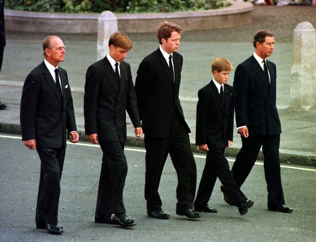 The Prince of Wales, Prince William, Prince Harry, Earl Althorp and Duke of Edinburgh walk behind Diana, the Princess of Wales’ funeral cortege 