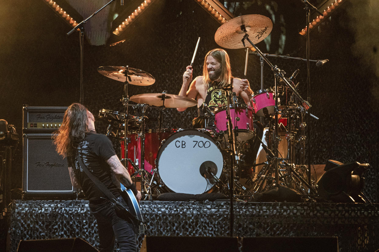 Dave Grohl, left, and Taylor Hawkins of the Foo Fighters perform at the Innings Festival at Tempe Beach Park on Saturday, Feb. 26, 2022, in Tempe, Ariz. (Photo by Amy Harris/Invision/AP)