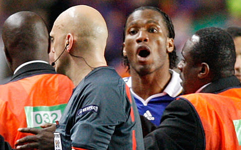 Didier Drogba shouts in the face of Tom Henning Ovrebo - Credit: AP