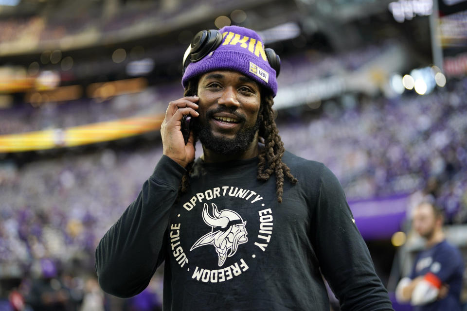 FILE - Minnesota Vikings running back Dalvin Cook stands on the field before an NFL wild card playoff football game against the New York Giants, Sunday, Jan. 15, 2023, in Minneapolis. Free agent running back Dalvin Cook is scheduled to visit with the New York Jets this weekend, according to a person with knowledge of the situation. The former Minnesota Vikings star, who turns 28 in August, could join a revamped Jets offense led by quarterback Aaron Rodgers and coordinator Nathaniel Hackett. (AP Photo/Charlie Neibergall, File)