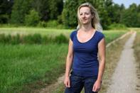 Diana Parini, a woman who turned down a low-wage waitressing job at an Italian alpine resort, poses for a photograph in Morimondo