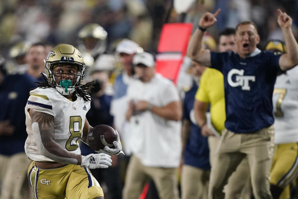 Georgia Tech wide receiver Nate McCollum (8) runs the ball in for a touchdown against Western Carolina during the first half of an NCAA college football game Saturday, Sept. 10, 2022, in Atlanta. (AP Photo/Brynn Anderson)