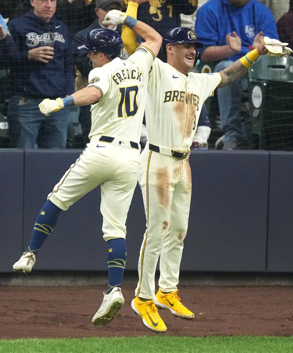 The Brewers' Sal Frelick (10) celebrates with third baseman Joey Ortiz after hitting his two-run home run during the second inning Tuesday night at American Family Field.