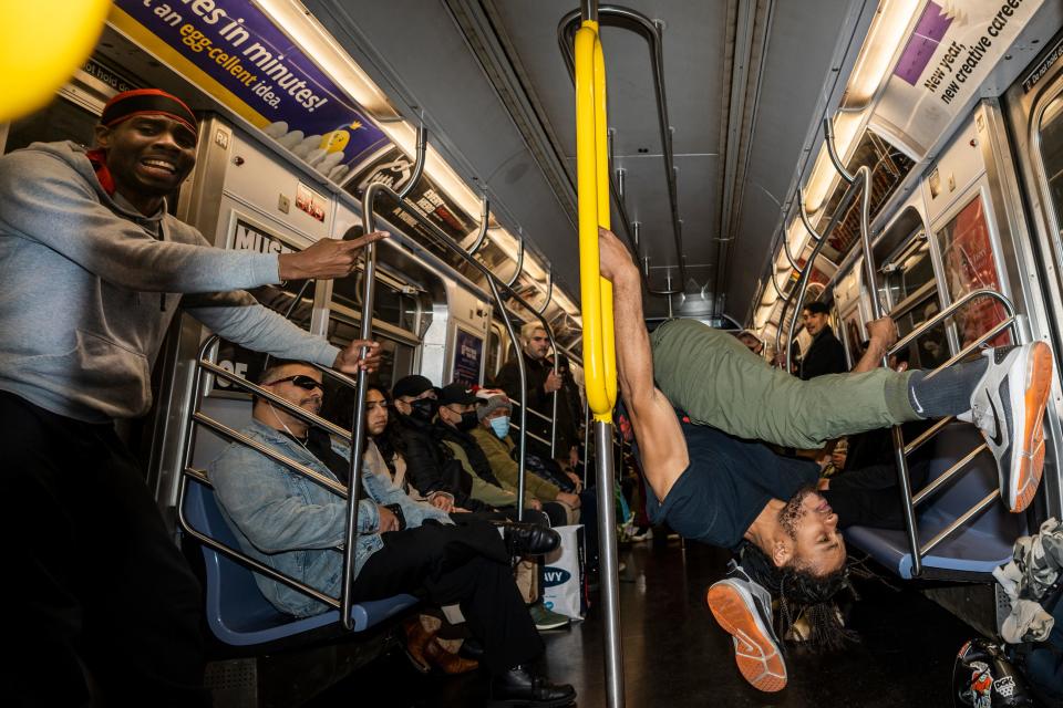 D-Astro (left) and Deno (right) perform on the subway on Wednesday, November 16, 2022.