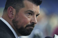 FILE — Ohio State head coach Ryan Day talks to reporters during an NCAA college football news conference at the Big Ten Conference media days, in this file photo from July 27, 2022, in Indianapolis. Nine months later, the sting of losing to Michigan is still fresh for Ohio State. Coach Ryan Day said it's been the source of motivation for everyone at the Woody Hayes Athletic Center. (AP Photo/Darron Cummings, File)