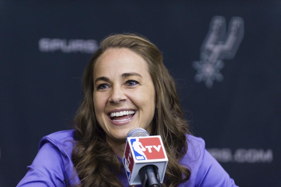 FILE - In this Aug. 5, 2014, file photo, Becky Hammon takes questions from the media at the San Antonio Spurs practice facility after being introduced as an assistant coach with the team, in San Antonio. (AP Photo/Bahram Mark Sobhani, File)